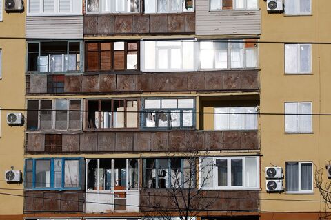 Фасад дома с балконами